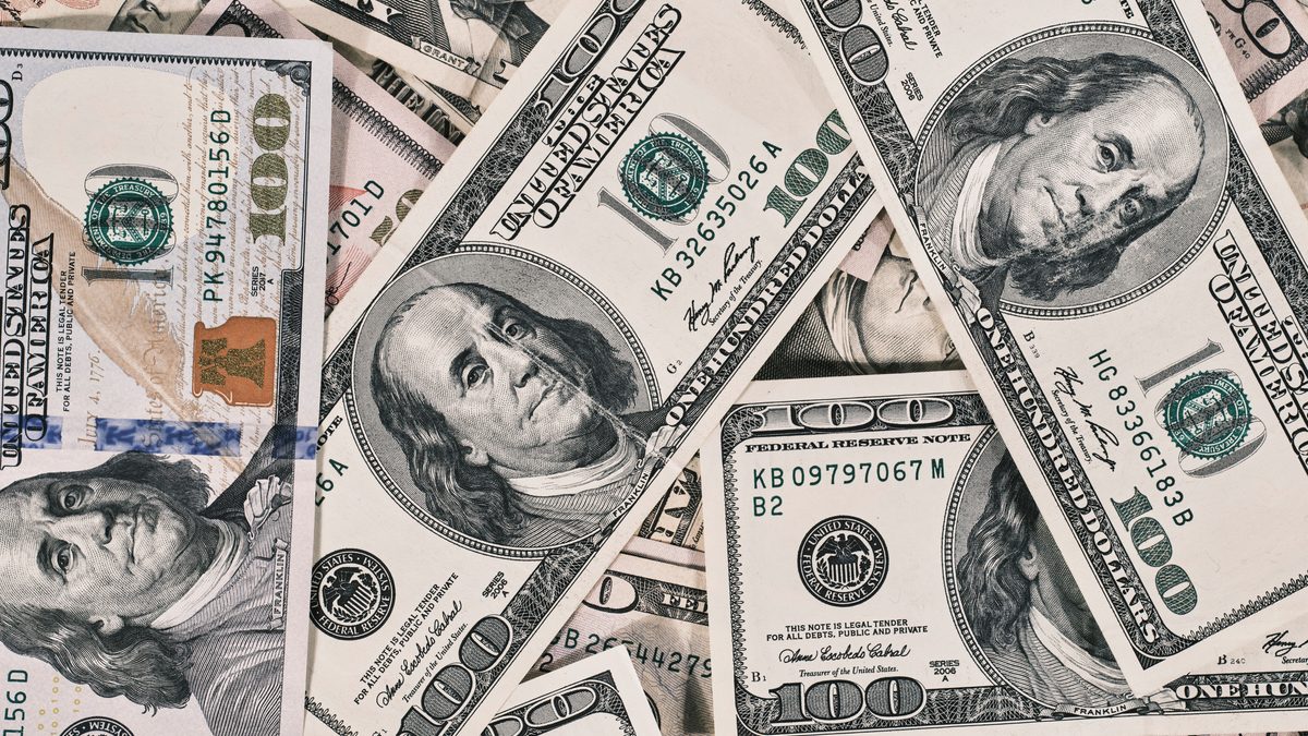 Detailed close-up of US dollar bills highlighting wealth and finance concepts.
