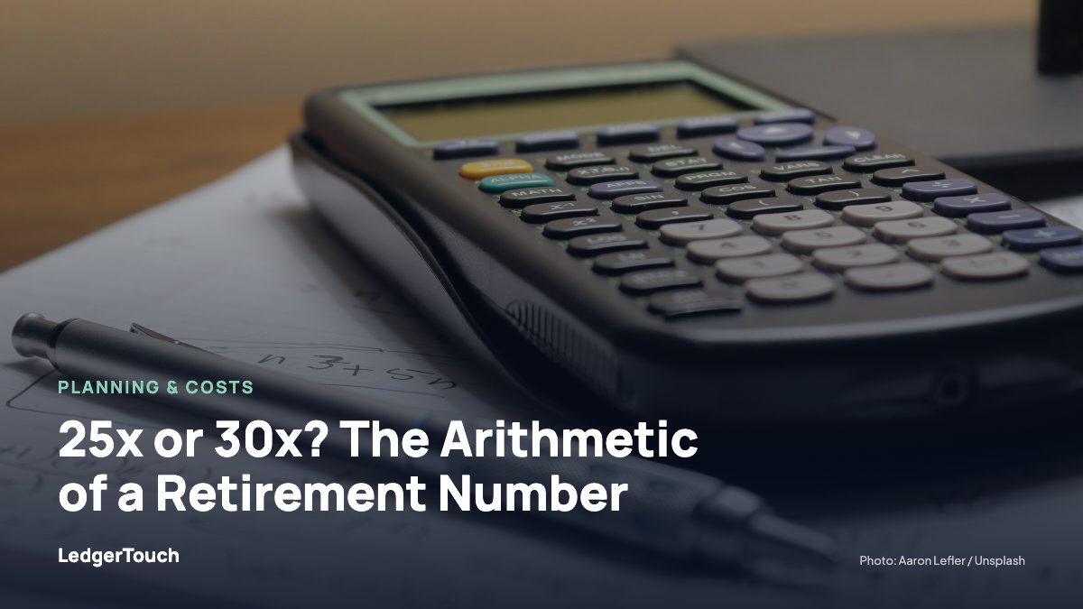 A calculator and a pen sitting on top of a piece of paper.